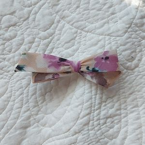 Cute floral bow hair clip with floral detail